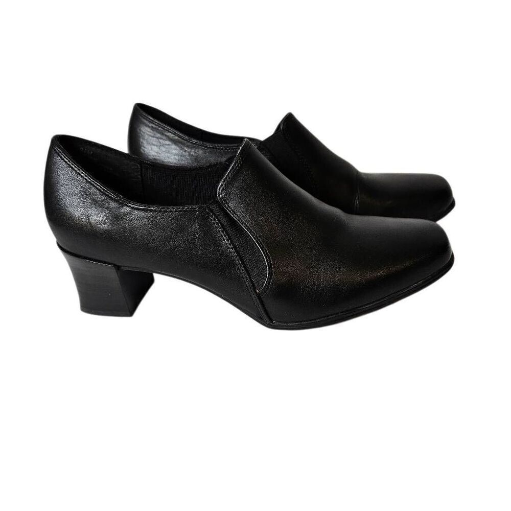 Liz Baker black leather slip on shoes with a block heel. Size 9.5.
